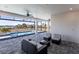 Relaxing patio area overlooking a refreshing pool at 5061 Collingswood Blvd, Port Charlotte, FL 33948