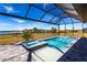 Relaxing pool and spa with covered lanai and scenic views at 5061 Collingswood Blvd, Port Charlotte, FL 33948