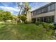 Well maintained backyard featuring mature trees, and an irrigation system at 445 Palm Tree Dr, Bradenton, FL 34210