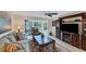 Inviting living room with comfortable seating and seamless access to a bright outdoor patio at 445 Palm Tree Dr, Bradenton, FL 34210
