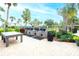 Outdoor grilling station with picnic tables at 5855 Midnight Pass Rd # 416, Sarasota, FL 34242