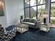 Comfortable seating area with large windows at 5855 Midnight Pass Rd # 416, Sarasota, FL 34242