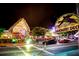 Daiquiri Deck bar at night, showing outdoor seating at 5855 Midnight Pass Rd # 416, Sarasota, FL 34242