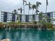 Building with a pond and waterfall feature at 5855 Midnight Pass Rd # 416, Sarasota, FL 34242