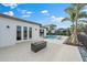 Luxury backyard oasis with pool, patio, and fire pit at 3739 Caledonia Ln, Sarasota, FL 34240