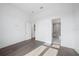 Hardwood floor bedroom with ensuite bathroom access at 3739 Caledonia Ln, Sarasota, FL 34240