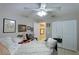 Charming bedroom with a queen-size bed and lots of natural light at 620 Burke Rd, Venice, FL 34293