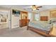 Spacious bedroom with wood furniture and carpet flooring at 6505 10Th W Ave # 5618, Bradenton, FL 34209