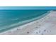 Expansive beach with turquoise water and people relaxing at 1660 Summerhouse Ln # 102, Sarasota, FL 34242