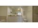 Elegant bathroom with double vanity and large mirror at 1660 Summerhouse Ln # 102, Sarasota, FL 34242