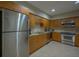 Community kitchen with stainless steel appliances at 1660 Summerhouse Ln # 102, Sarasota, FL 34242