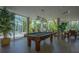 Game room featuring a pool table and natural light at 1660 Summerhouse Ln # 102, Sarasota, FL 34242