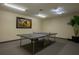 Community game room with a ping pong table, recessed lighting, and neutral paint and carpet at 1660 Summerhouse Ln # 102, Sarasota, FL 34242