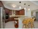 Modern kitchen with granite countertops and stainless steel appliances at 1660 Summerhouse Ln # 102, Sarasota, FL 34242