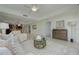 Open concept living room with kitchen and dining area views at 1660 Summerhouse Ln # 102, Sarasota, FL 34242