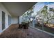 Private patio with pavers, pergola, and outdoor seating at 1660 Summerhouse Ln # 102, Sarasota, FL 34242