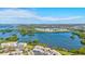 Aerial view of waterfront community with lush landscaping and resort-style amenities at 10037 62Nd N Ter # 23, St Petersburg, FL 33708