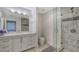 Bathroom with walk in shower and vanity at 611 Riviera Dunes Way # 702, Palmetto, FL 34221