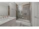 Bathroom with a shower/tub combo and white vanity at 611 Riviera Dunes Way # 702, Palmetto, FL 34221