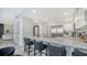 Open concept kitchen with a large island and stainless steel appliances at 611 Riviera Dunes Way # 702, Palmetto, FL 34221