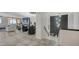 Spacious living room with fireplace and stunning water views at 611 Riviera Dunes Way # 702, Palmetto, FL 34221
