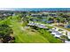 Aerial view of community near golf course and bay at 5923 43Rd W St, Bradenton, FL 34210