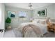 Main bedroom with water view and stylish decor at 1654 Waxwing Ct, Venice, FL 34293