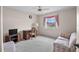 Bright bedroom with window seat and view at 1654 Waxwing Ct, Venice, FL 34293