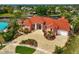 Luxury home, tile roof, circular driveway, waterfront property at 4409 Crews Ct, Port Charlotte, FL 33952