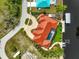 Bird's eye view of a waterfront home with pool and dock at 4409 Crews Ct, Port Charlotte, FL 33952