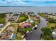 Waterfront home with pool and dock, neighborhood overview at 4409 Crews Ct, Port Charlotte, FL 33952