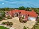 Large home with tile roof and landscaped yard, waterfront location at 4409 Crews Ct, Port Charlotte, FL 33952