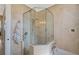 Bathroom with a large walk-in shower and tile surround at 4409 Crews Ct, Port Charlotte, FL 33952