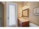 Small bathroom with single vanity and shower at 4409 Crews Ct, Port Charlotte, FL 33952