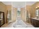 Spa-like bathroom with soaking tub and walk-in shower at 4409 Crews Ct, Port Charlotte, FL 33952