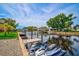 Private boat docks with two jet skis, perfect for water activities at 4409 Crews Ct, Port Charlotte, FL 33952