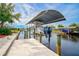 Covered boat lift for convenient boat storage and access at 4409 Crews Ct, Port Charlotte, FL 33952