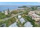 Aerial shot of high-end waterfront properties offering stunning views of the shoreline at 5005 Gulf Of Mexico Dr # 5, Longboat Key, FL 34228