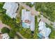 Beautiful home featuring a luxurious backyard pool and serene rooftop deck at 5005 Gulf Of Mexico Dr # 5, Longboat Key, FL 34228