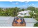 This home has a rooftop deck with beautiful neighborhood views at 5005 Gulf Of Mexico Dr # 5, Longboat Key, FL 34228