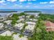 Aerial view showcasing the community's waterfront location at 542 Sutton Pl, Longboat Key, FL 34228