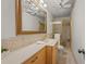 Clean bathroom with shower/tub combo and updated vanity at 542 Sutton Pl, Longboat Key, FL 34228