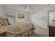 Comfortable bedroom with carpeted floor and large closet at 542 Sutton Pl, Longboat Key, FL 34228