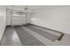 Spacious garage with epoxy flooring and ample storage space at 542 Sutton Pl, Longboat Key, FL 34228