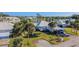 Aerial view of a home in a community with golf course and water features at 437 Wexford Cir # 79, Venice, FL 34293