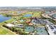 Aerial view of community amenities, including pool and tennis courts at 12720 Sorrento Way # 102, Bradenton, FL 34211