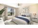 Main bedroom with golf course view and neutral decor at 12720 Sorrento Way # 102, Bradenton, FL 34211