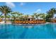 Resort-style pool with plenty of lounge chairs at 12720 Sorrento Way # 102, Bradenton, FL 34211