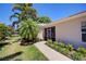 Screened patio area with walkway leading to a pond at 8047 Victoria Falls Cir, Sarasota, FL 34243