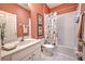 Clean bathroom with a shower/tub combo and patterned shower curtain at 8047 Victoria Falls Cir, Sarasota, FL 34243